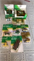 John Deere 1/64 toys on cards, 10 total