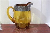 A Silver Overlay Amber Glass Pitcher