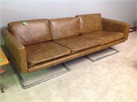 Mid century couch, in basement, matches Lot 13