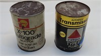 empty old automotive oil cans
