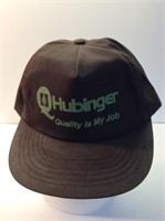 Hubinger Quality is my job snapped a football cap
