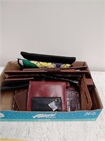 Group of assorted men and women's wallets