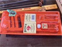 Gun cleaning rods, yard sticks, and other items