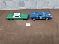 2 Vintage tin metal cars