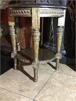 Round marble top ornate wood side table.