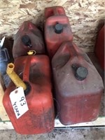 4 RED GAS CANS