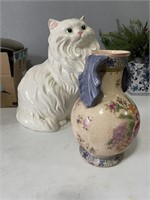 Large White ceramic cat, floral vase w/blue handle