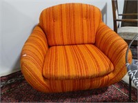R. HUBER MID CENTURY UPHOLSTERED ROLLING CHAIR