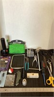 Various scissors, tools, coping saw, flashlight