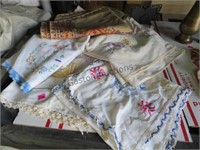 ASSORTED EMBROIDERED TABLE RUNNERS AND TABLE