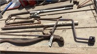 Pump handle, hay hook, crow bar, misc steel pipes