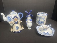 Two pieces of delft China , holland figurines