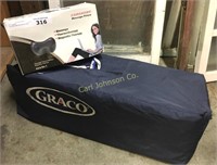 GRACO PORTABLE PLAYPEN + CAR & HOME MASSAGE PILLOW