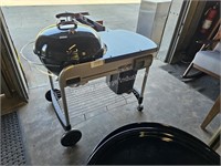 weber performance charcoal grill (lobby area)