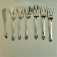 6 Sterling forks and 1 butter knife