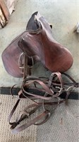 Vintage leather horse saddle, with some leather
