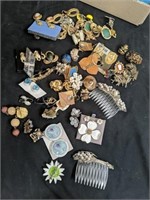 Large group of earrings, combs, Etc
