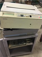 Xerox copier on cabinet (unsure if works)