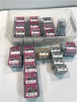 27 packs of screws assorted. Unopened