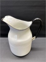 Vintage enamelware black handled pitcher jug