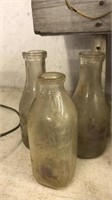 3 Vintage 1 quart milk bottles,