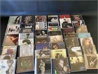 Over 40 CD's including Bon Jovi, Elvis, Adele