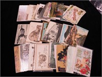 Group of vintage postcards including real photo