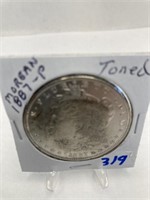 1887 Silver Silver Dollar XF Toned