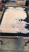 Antique Asian hand-knotted rug