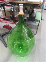 Green glass wine jug, 25" x 17" dia
