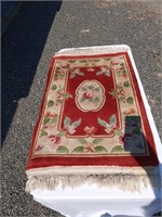 Two Throw Rugs