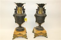 Antique Urns on marble base w/ mounted griffins