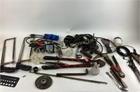 Bolt cutters, hand saws, saw blade, files, putty