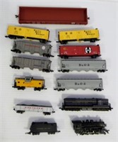 Lot of small train cars that include B and O,