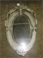 A Venetian-Style Oval Mirror