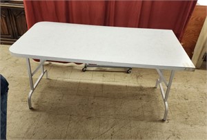 Heavy duty wooden folding table. 60"x30"x30"