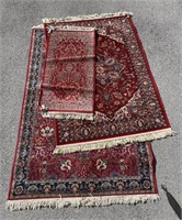 Three Patterned Area Rugs