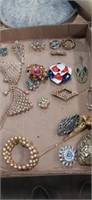 Lot with variety of brooches and more