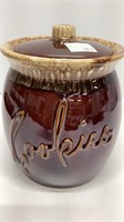 Cookie jar 8” tall. Brown glazed pottery.