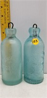 2 ANTIQUE EMBOSSED BOTTLES