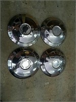 Set of four Chevrolet Corvair hubcaps please see