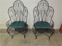 Pair Wrought iron peacock chairs.