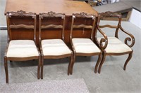FOUR CARVED WOODEN DINNING CHAIRS