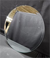 Frameless round mirror