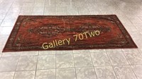 Large Oriental rug approximately 8 feet long by 4