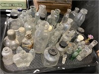 Vintage perfume & medicine bottles.
