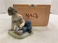 NAO BY LLADRO HAND MADE FIGURINE BOY WITH TRAIN IN
