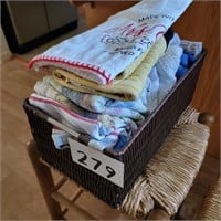 Basket Full of Kitchen Towels and Hot Pad
