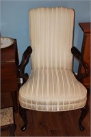 2 Formal arm chairs with cream color upholstery
