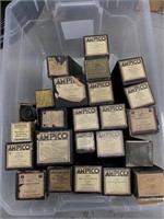 Large bin of piano rolls for a piano player,  most